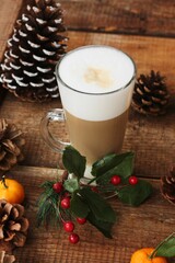 Coffee latte and forest cones on the table