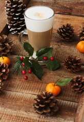 Coffee latte and forest cones on the table