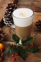 Coffee latte and forest cones on the table