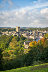 Fototapeta na wymiar Tall view of Richmond, North Yorkshire and the castle with autumn colours in the foreground