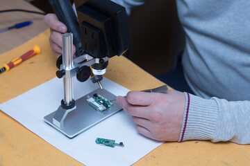 Digital microscope for repair of electronic components.