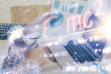 Science formula hologram with man working on computer on background. Education concept. Double...