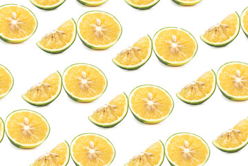Obraz premium fresh lime slices pattern on white color background. Minimal flat lay food texture