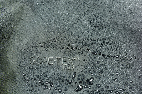 Niedomice, Poland - May 06, 2019: Effect of water repellent on a shell layer Gore-Tex Pro jacket.