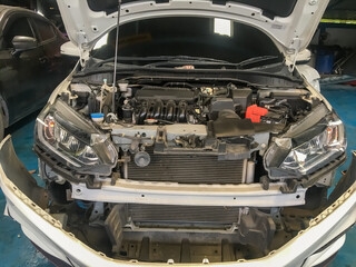 The car that had the accident was hit in the front until it collapsed.