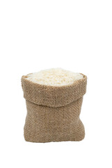 rice in a hemp bag on a white background close up