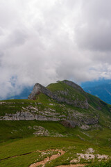 Fototapeta premium summer mountains green grass and blue sky landscape near achensee in austria, europe alps in cloudy day
