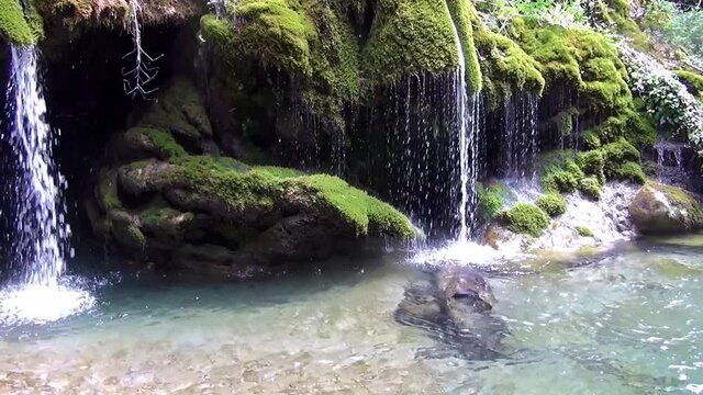 The beautiful waterfalls created by the Bussento river in the natural oasis Capello, Casaletto Spartano, Salerno, Italy, a UNESCO heritage site.