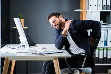Young Man With Back Pain