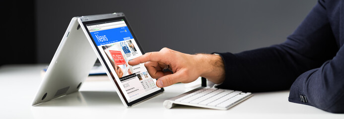 Read Online News Media On Laptop