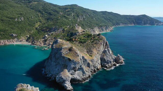 Aerial drone video from abandoned magnificent old castle of "Kastro" with great views to Aegean deep blue sea, Skiathos island, Sporades, Greece