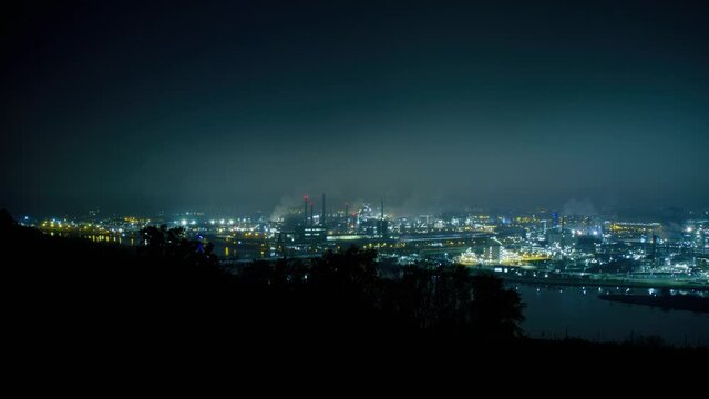 Night timelapse shot of giant industry complex in Linz