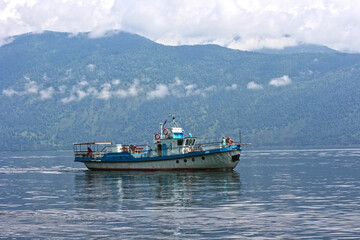 Teletskoye lake, Altai, Russia - 07 July 2019: boat in the lake