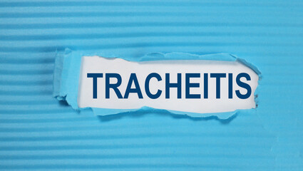 Tracheitis, text on white paper over torn paper background. medical concept