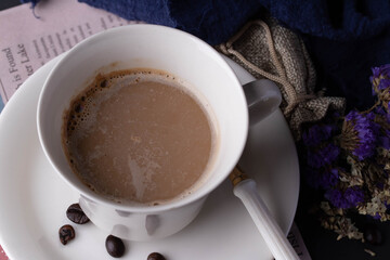 Hot coffee in white ceramic mug