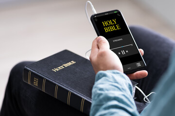 Christian Man Reading Bible Book And Praying