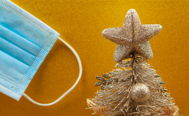 image of fir tree mask gold background 