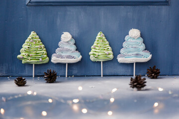 
New Year's candy meringue christmas tree with edible decorations, homemade christmas treat