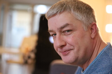 Close up portrait of grey haired caucasian man 47 years old 