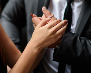 Obraz premium close up of people holding hands