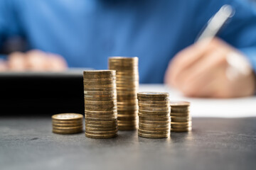 Income Tax And Saving Money Coins