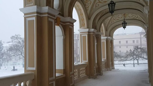 Snowstorm under the theater portico.