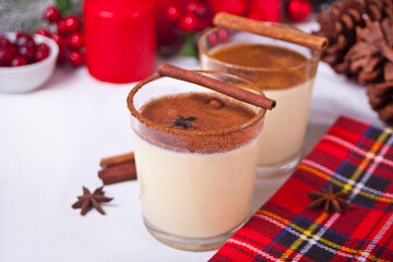 Glasses of holiday egg nog on the celebration table