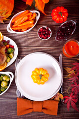 Autumn table setting. Thanksgiving dinner and autumn decoration.
