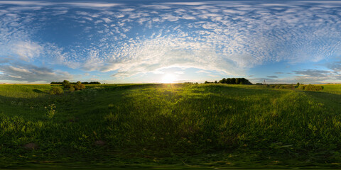 Sunset on meadow spherical 360 degree panorama