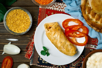 Lenten dolma or vegetable cabbage rolls - pasuts tolma is a vegetarian dish of Armenian, Caucasian cuisine. Top view
