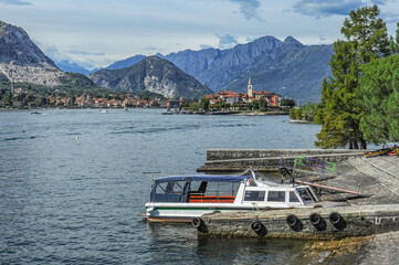 Obraz premium The noble Borromini family, who owned the entire lake Lago Maggiore, built a palace on a rocky island in the 17th century and set up two parks, using imported fertile land. 