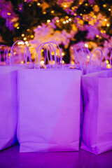 Christmas gift bags closeup under the christmas tree