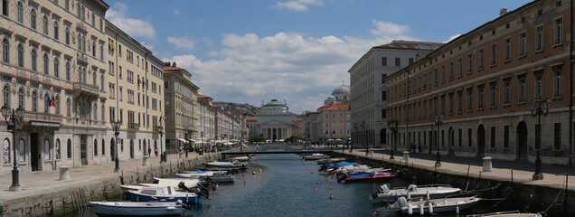 Panorama of Borgo Teresiano in Trieste, characterized by the Grand Canal, ancient buildings on both...