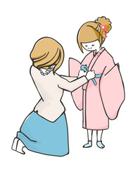 着物を着せてもらう子供