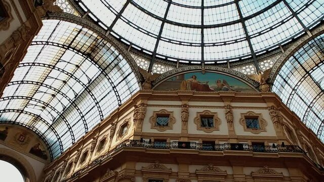 Ancient Galleria Vittorio Emanuele footage.Oldest Italian shopping mall in center of Milano.Footage from popular tourist attraction with luxury brand shops