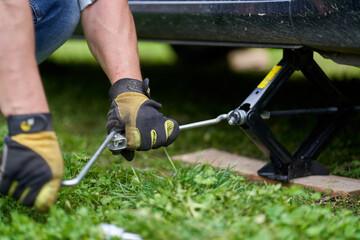 Man changing a flat tyre