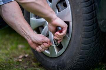 Man changing a flat tyre