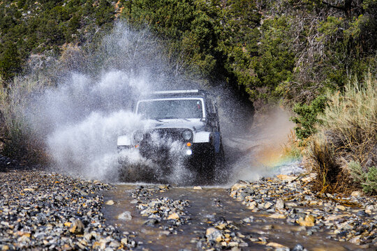 off road vehicle in the river