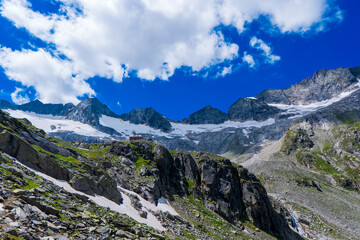 Fototapeta na wymiar Mountains and peaks landscape covered with glaciers and snow, natural environment. Hiking in the Dreil�er Tour. Hohe Tauern Austrian Alps, Europe
