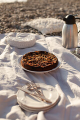 Beach picnic with cake and tea
