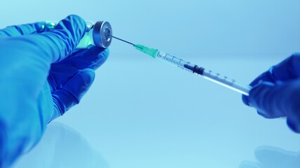 Hand of scientists in blue gloves holding vial with safe and effective vaccine against virus....