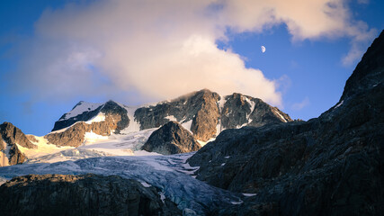 Moon and Glacier at Sunset