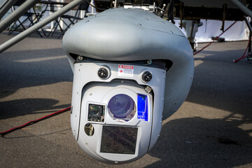Multi-Sensor surveillance pod under an airplane.