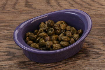 Tasty capers in the bowl
