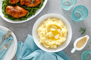Boiled mashed potatoes with butter and gravy