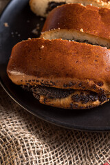 Autumn still life, fresh baked bun on wooden background