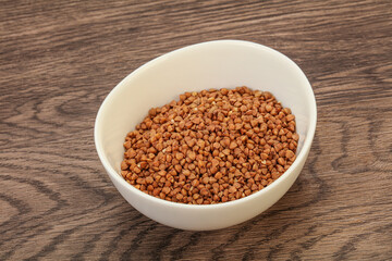 Raw buсkwheat cereal in the bowl