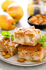 Vegetarian pear pie with almond nuts and cinnamon