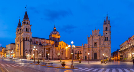 Fototapeta na wymiar Acireale - The Duomo (Maria Santissima Annunziata) and the church Basilica dei Santi Pietro e Paolo at dusk.