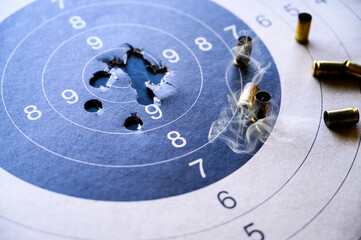 Bullet casing with paper target